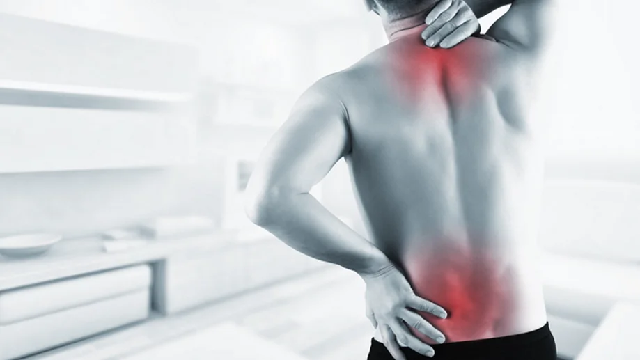 man suffering back pain